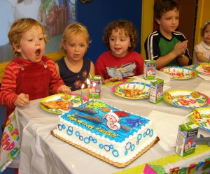 hart-blowing-out-candles-at-bouncing-angels-party