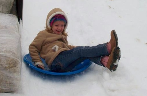 Snow sledding Savannah Madrac Farms 